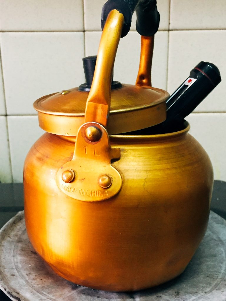 Water boiling in my beautiful copper kettle [ A different kind of a sunrise ]